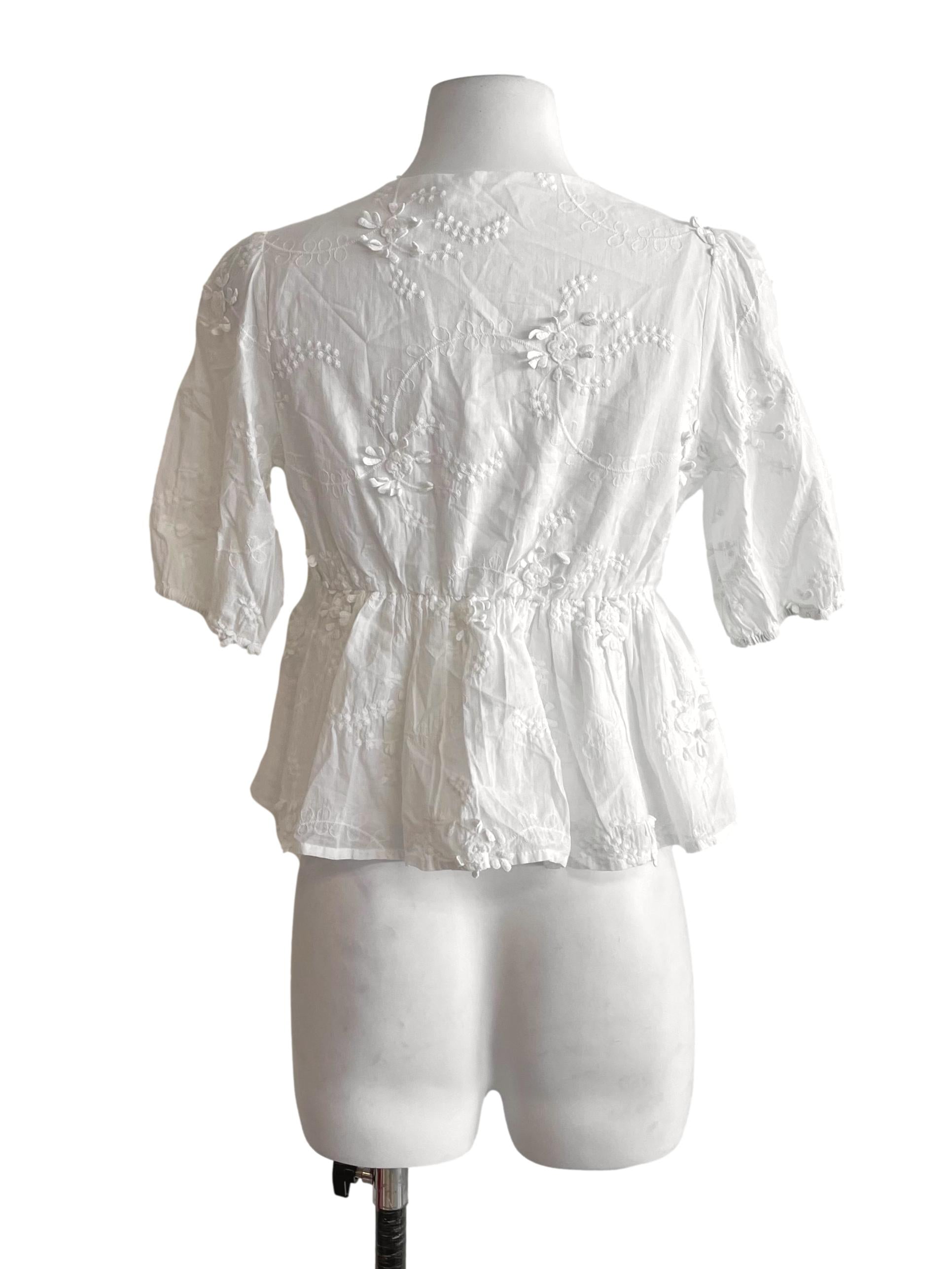 White Floral Peplum Top TWL