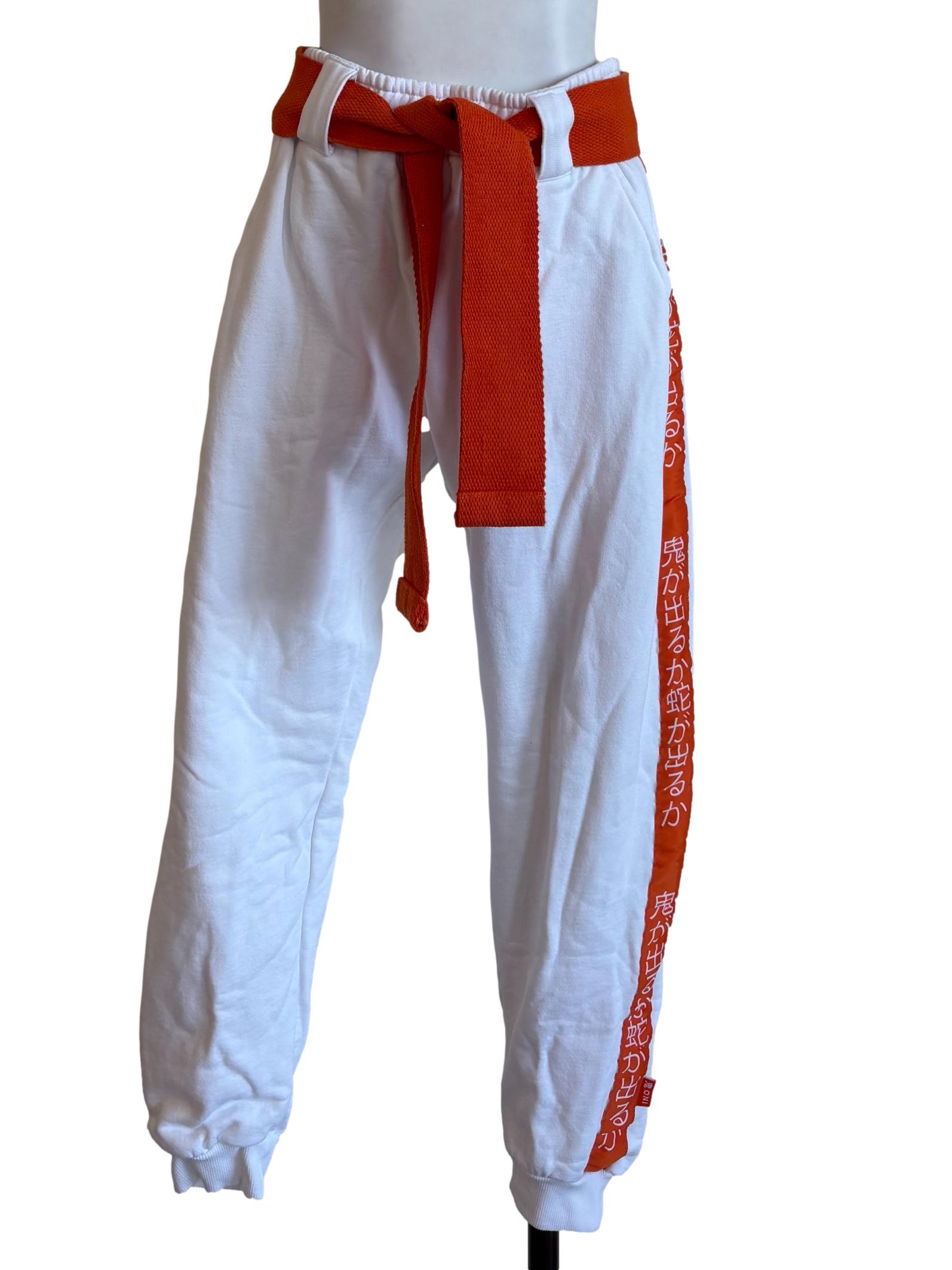 White Sweatpants With Orange Belt