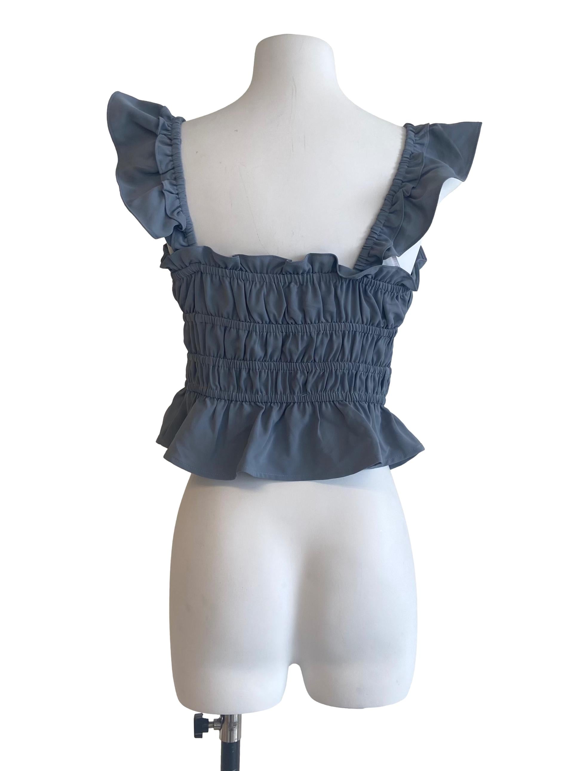 Stone Blue Sleeveless Ruffled Blouse