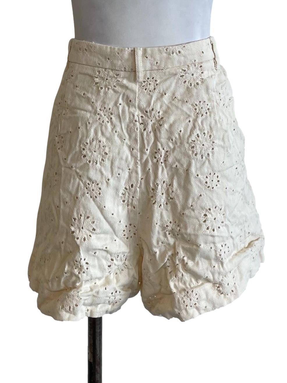 Light Yellow Eyelet Peplum Shorts