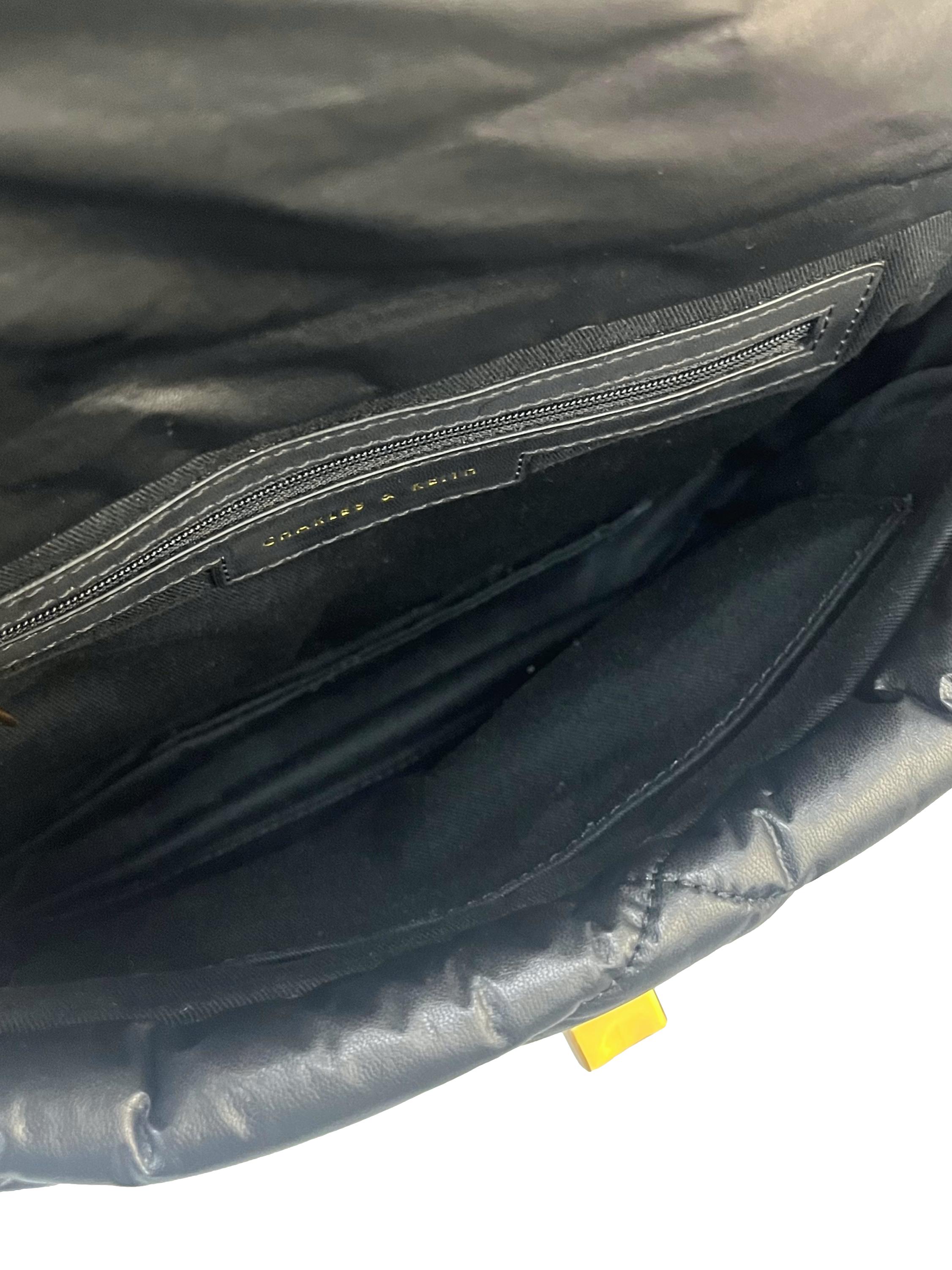 Black Puffy Quilted Shoulder Bag With Gold Chain