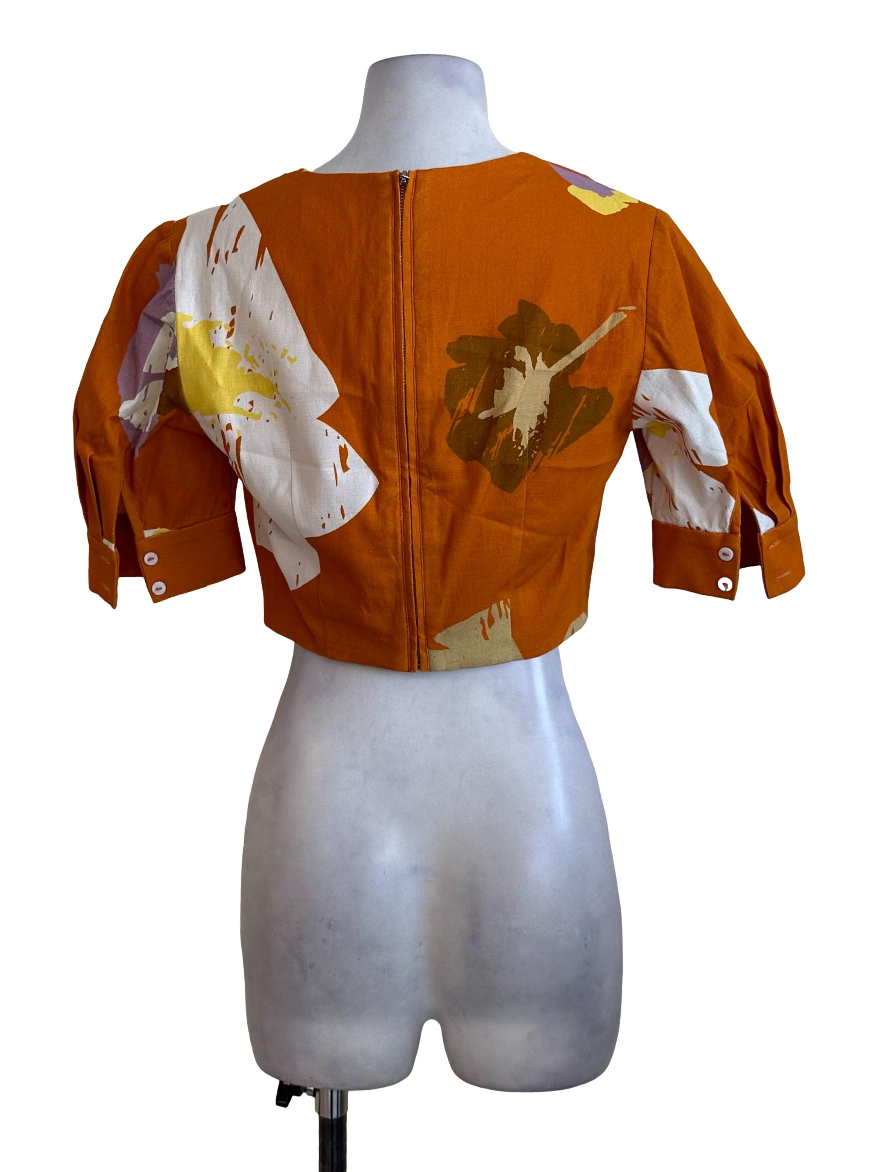 Brick Orange Pattern V Neck Top  OSN
