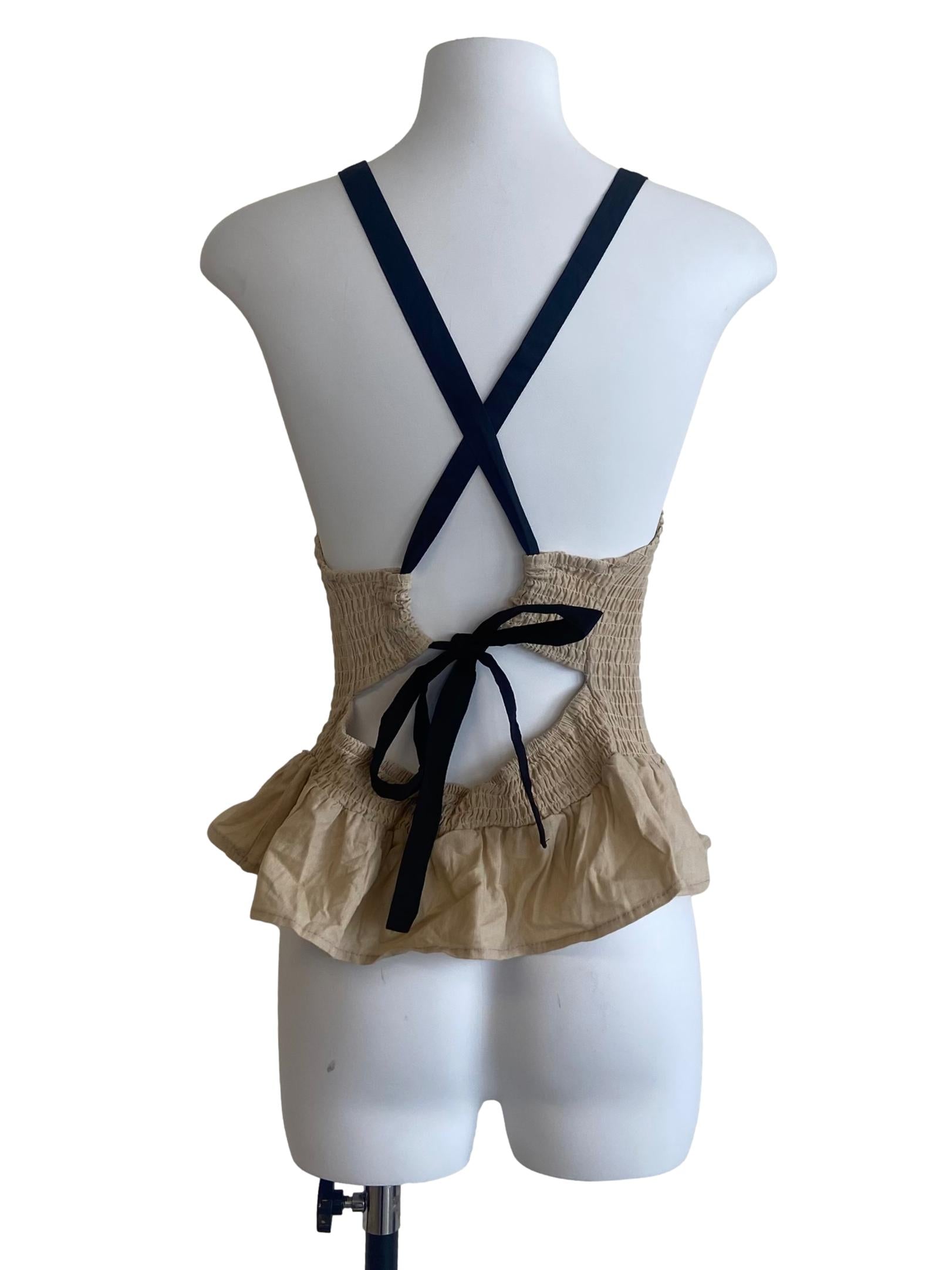 Parchment Beige Sleeveless Peplum Top