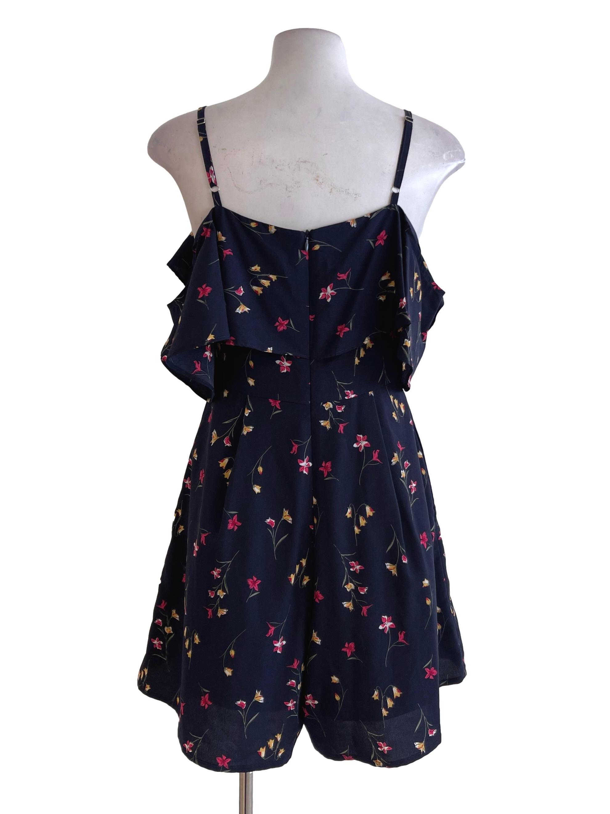 Navy Blue Lilies Printed Waterfall Bust Rompers