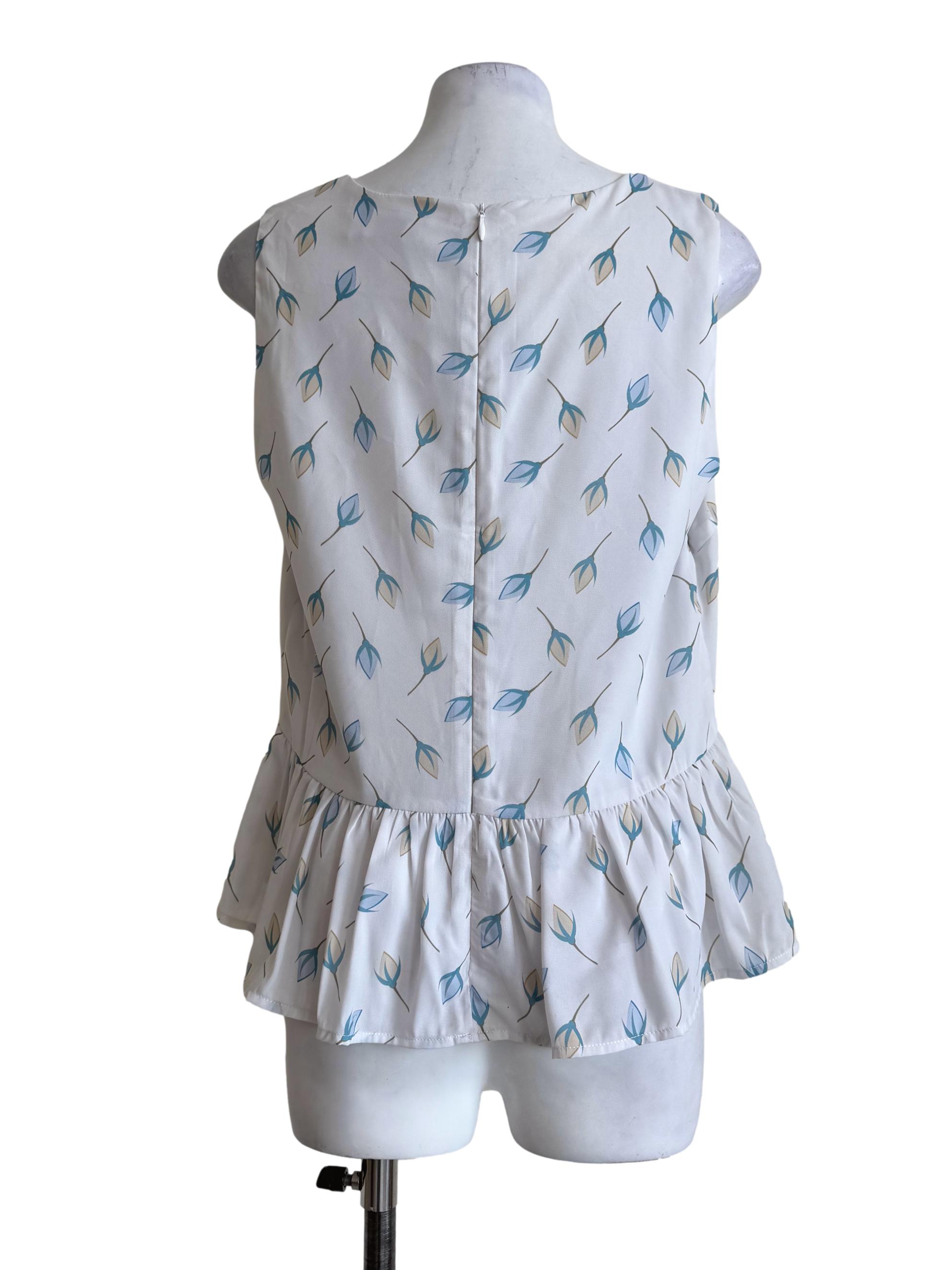 Pale White With Prints V Neck Sleeveless Top