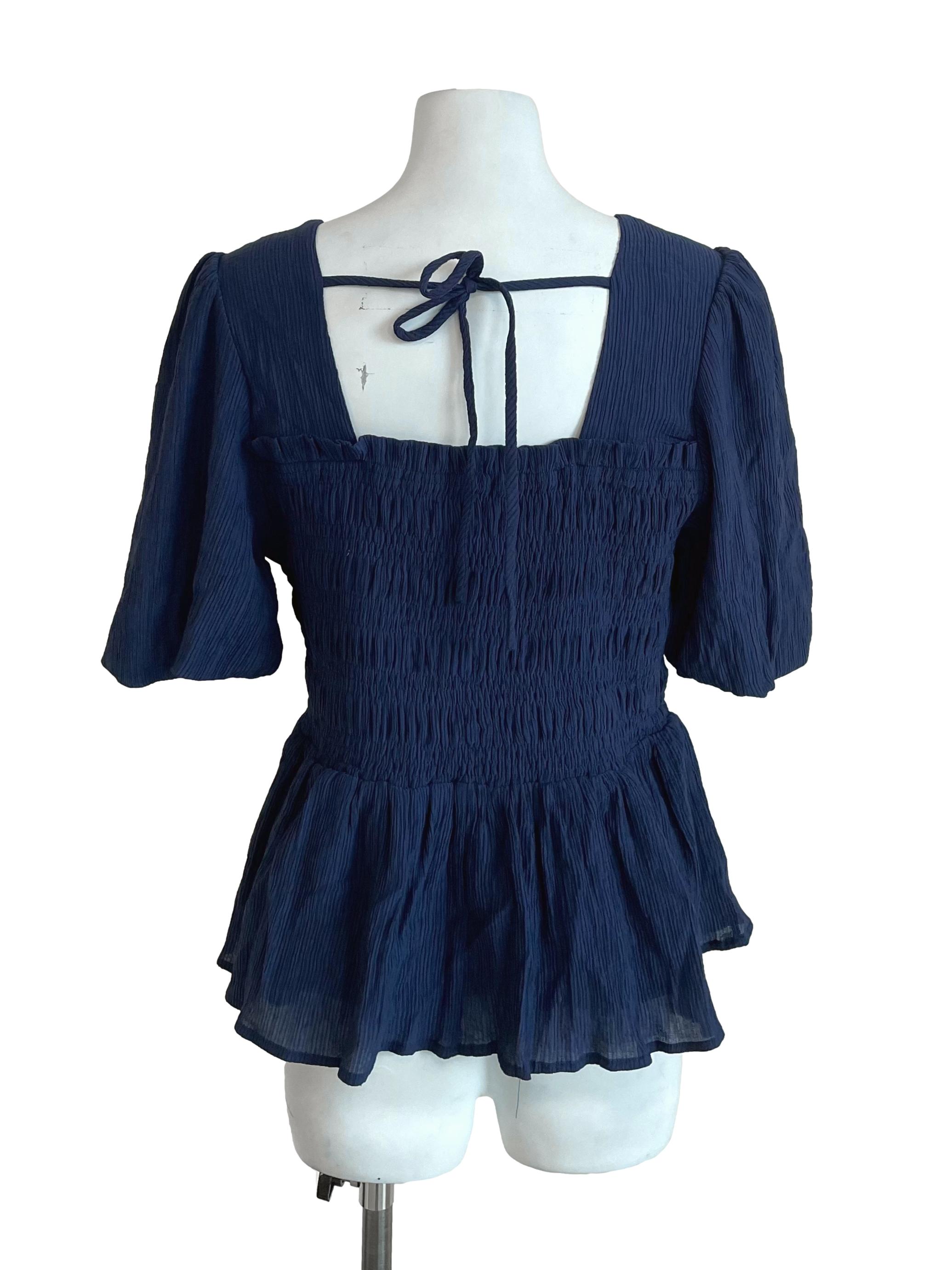 Navy Shirred Peplum Top