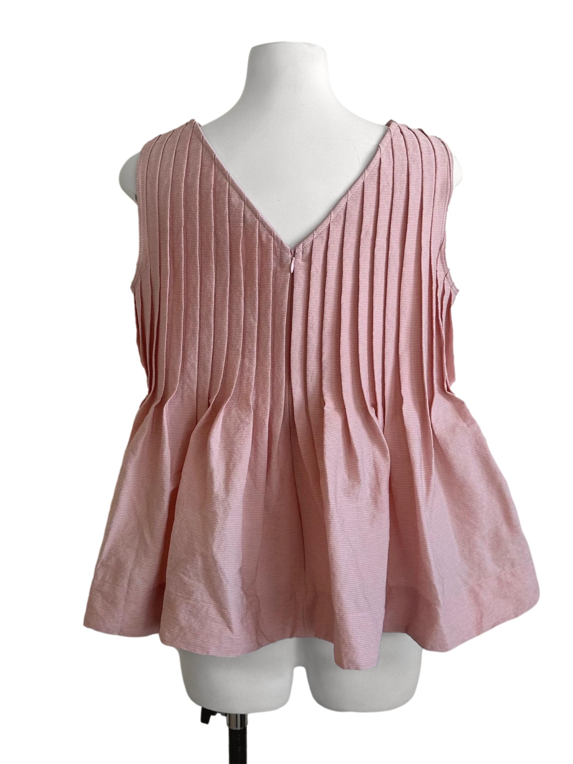 Light Pink Textured Pleated Peplum Top