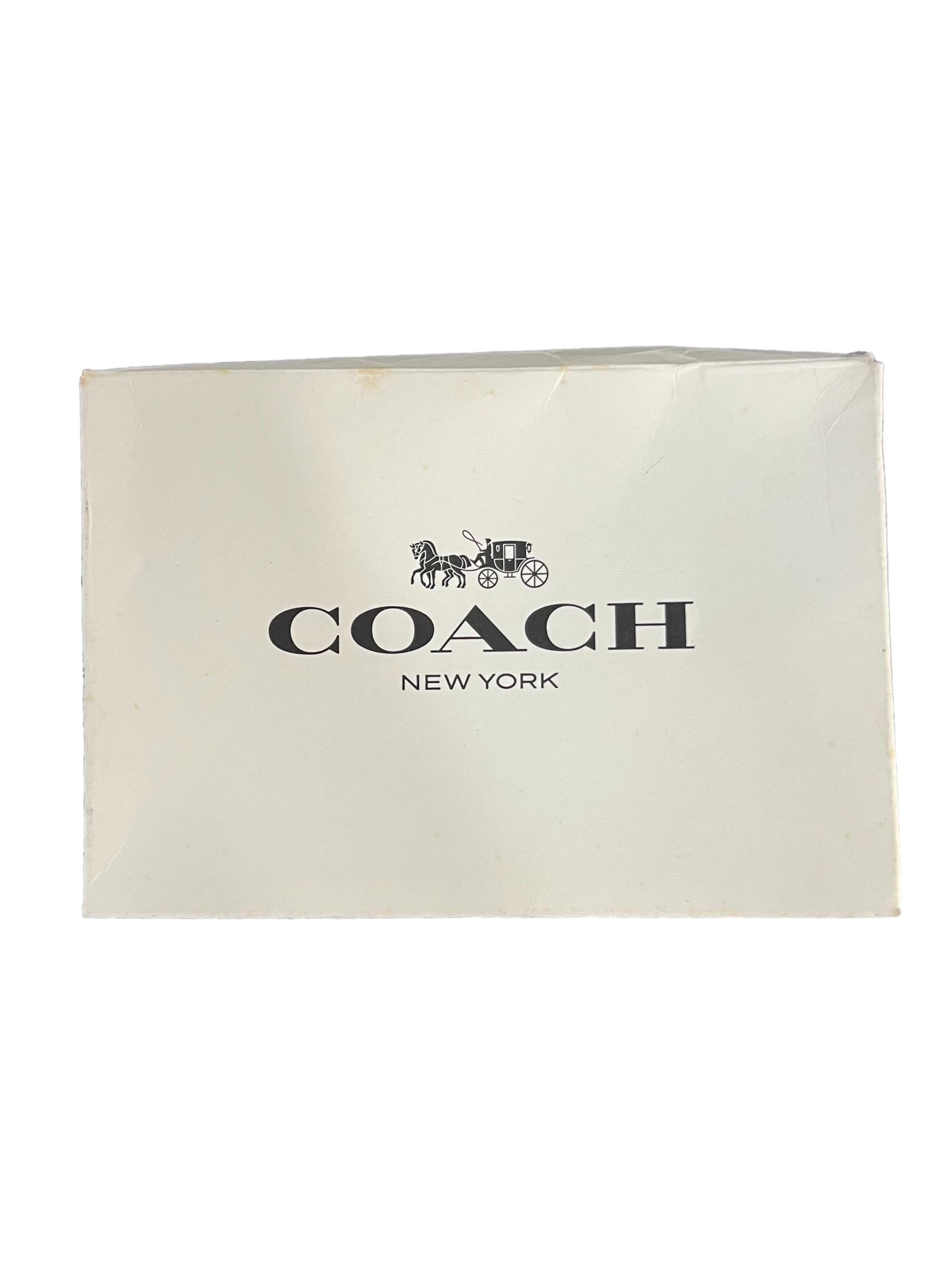 Brown Monogram With Prints Corner Wristlet CSN