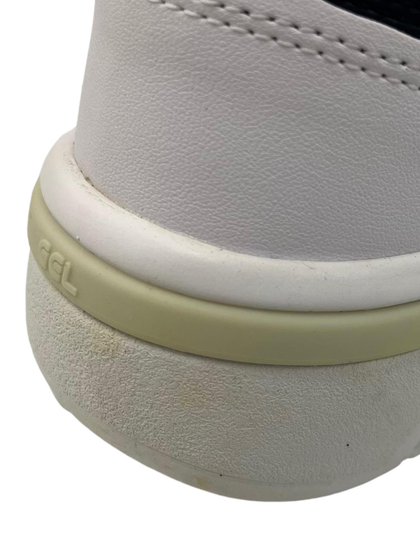 White Sneakers With Black Details