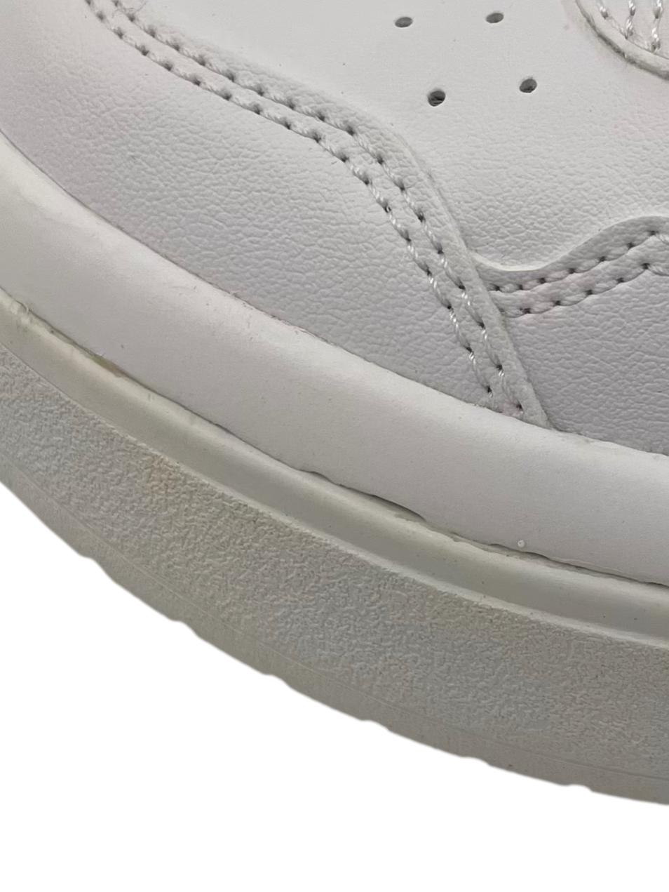 White Sneakers With Black Details