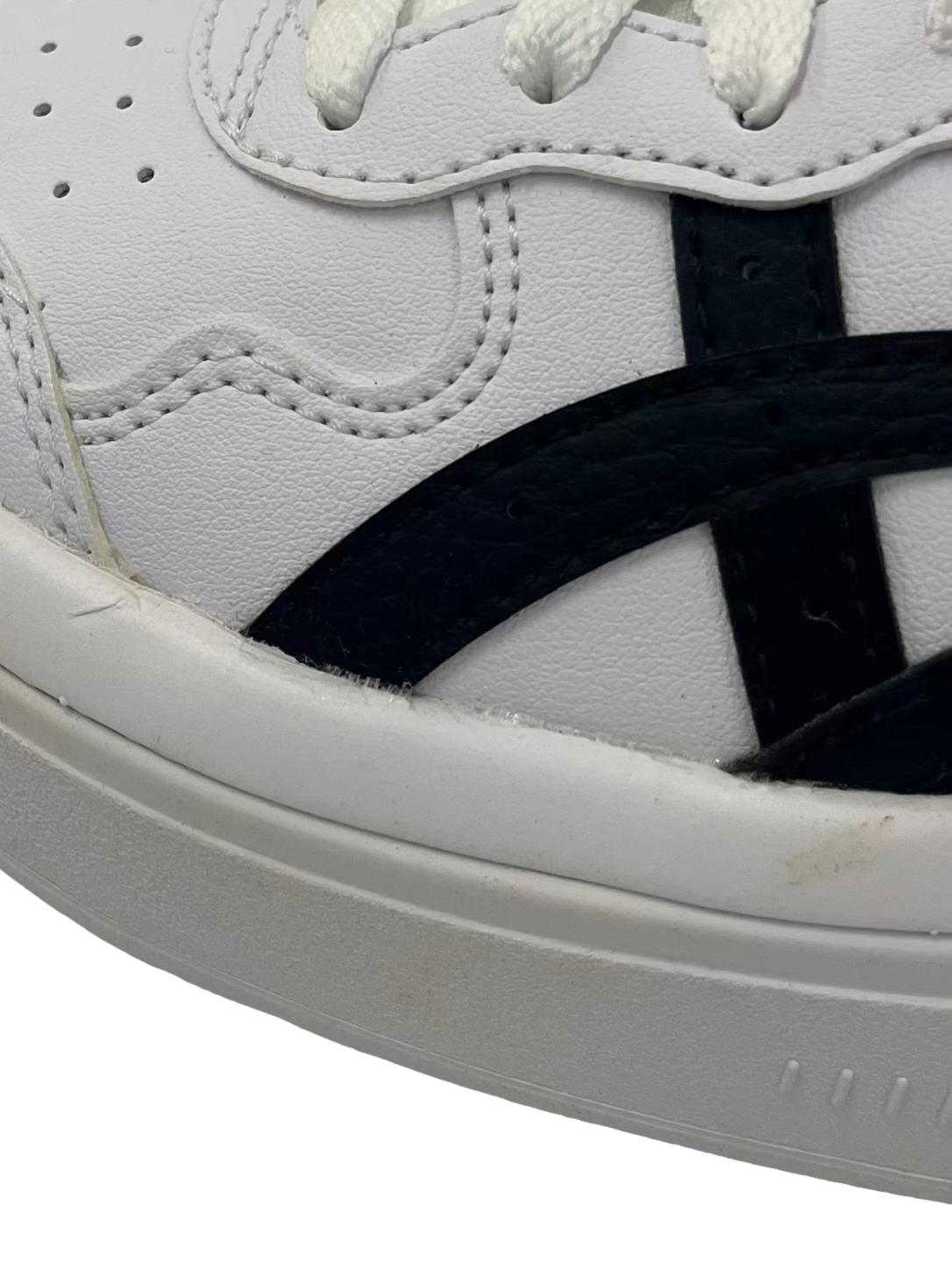 White Sneakers With Black Details