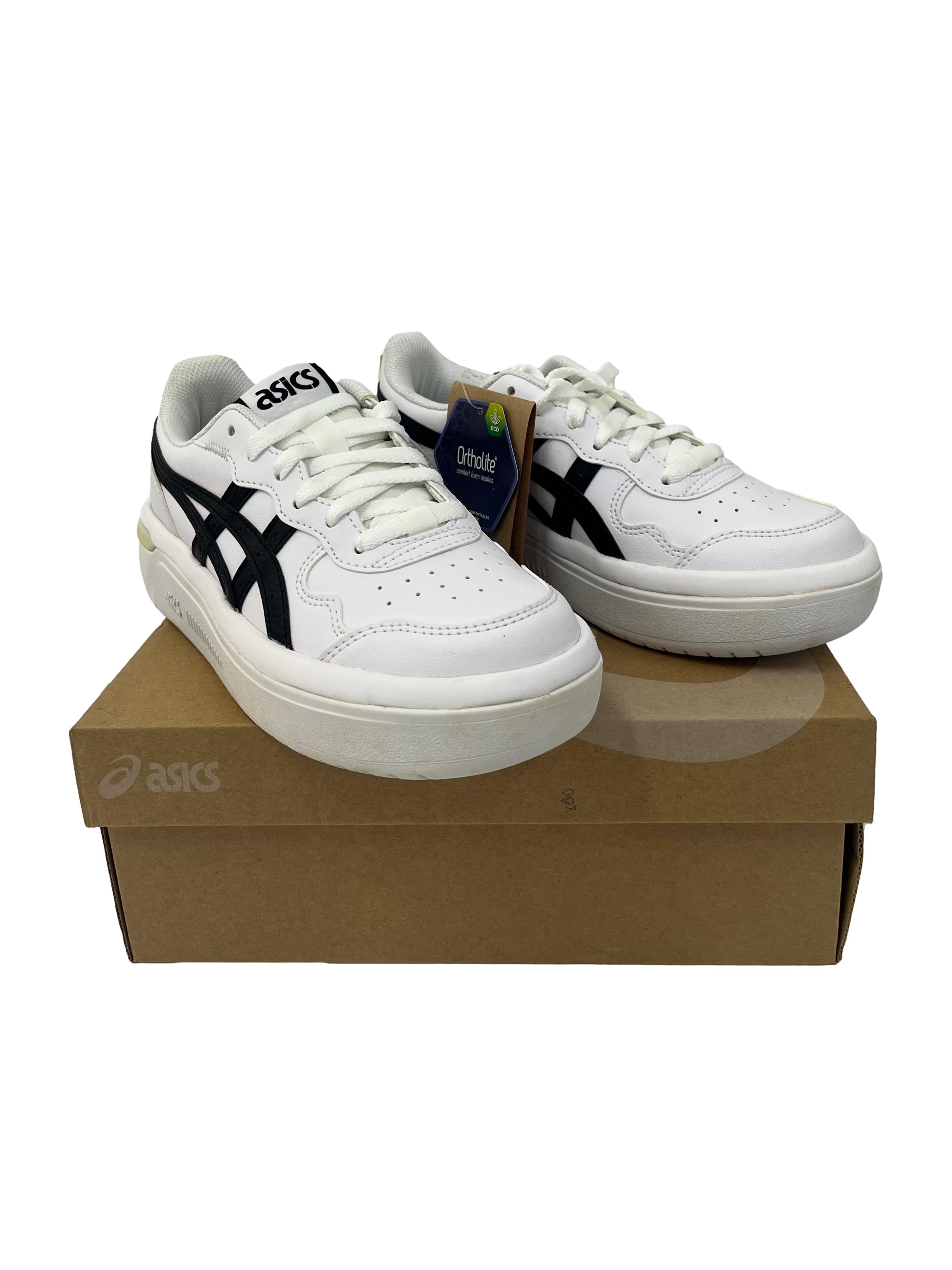 White Sneakers With Black Details